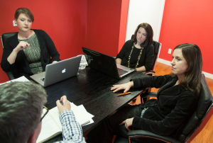 Members of the 金博体育 team during a meeting with a client / Photo by Joe Epstein
